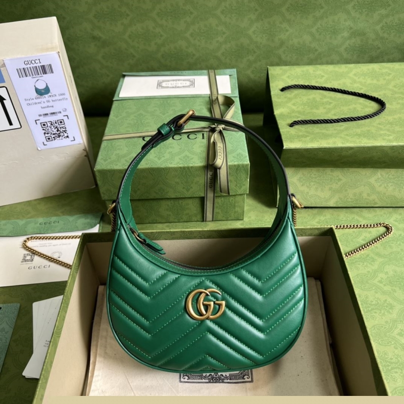 G*u*i top handle bags